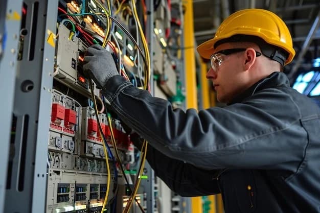 Technician carrying out equipment maintenance